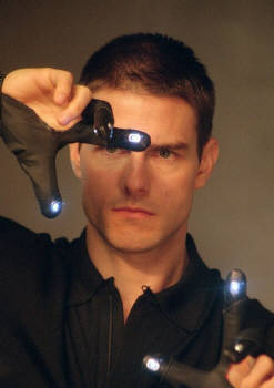 Tom Cruise wearing a headset covered in lights